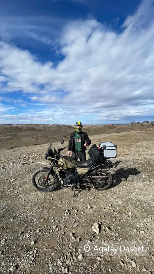 Moto2Kech rider and motorcycle in the Agafay landscape