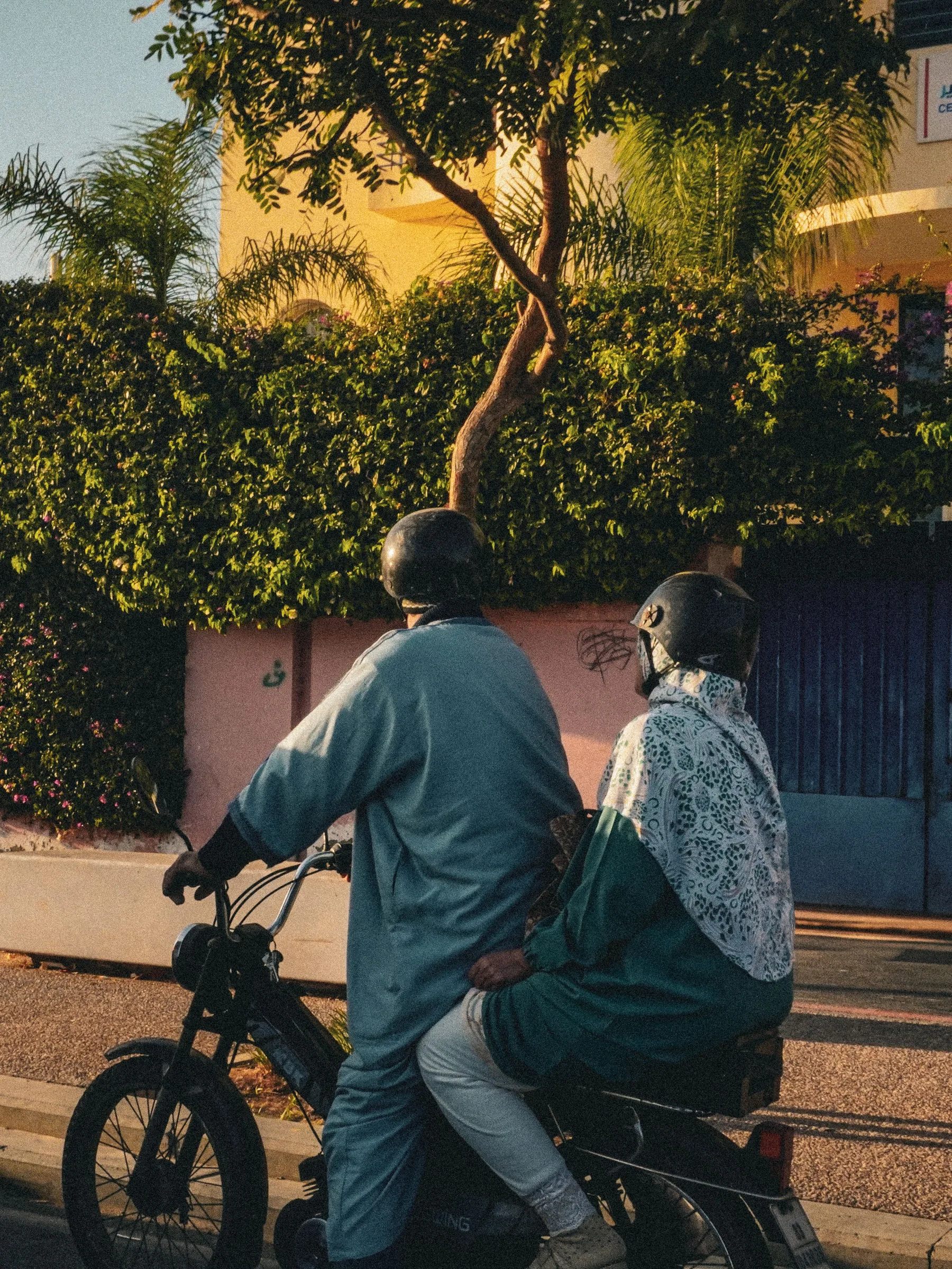 Motorcycle riders on a Moroccan city street